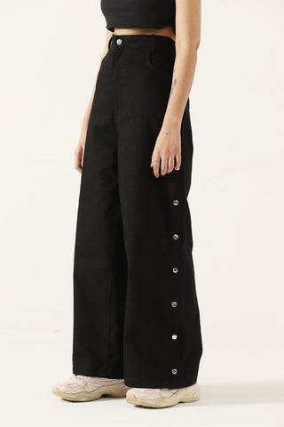 Snap button denim trousers