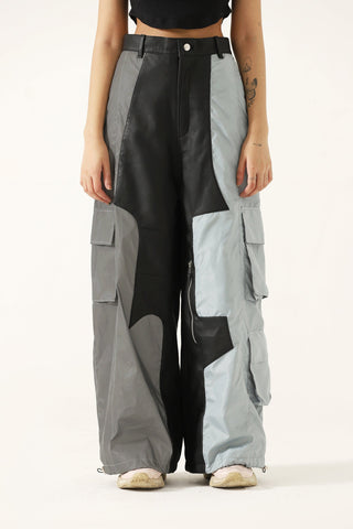"2001" paneled leather/nylon pants