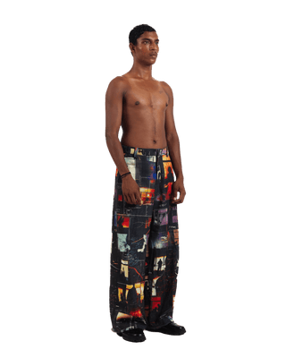 "Nocturnal ride" printed straight-leg trousers