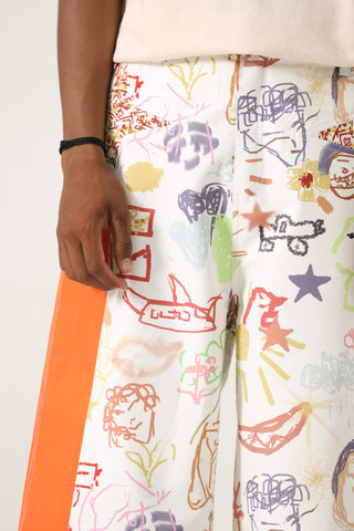 "Life is a doodle" printed trousers