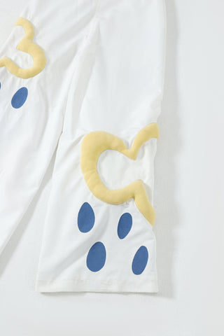 Embroidered cotton flared trousers