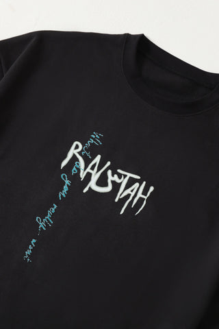 "Is this it?" black T-shirt