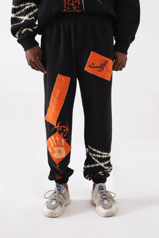 "BREATH OF FIRE" HANDPRINTED SWEATPANTS - Rastah