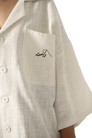 beige handwoven button down