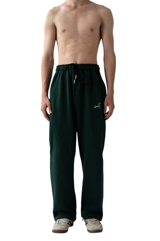 Rastah emerald green heavyweight terry knit sweatpants with a relaxed straight-leg fit and elastic waistband.
